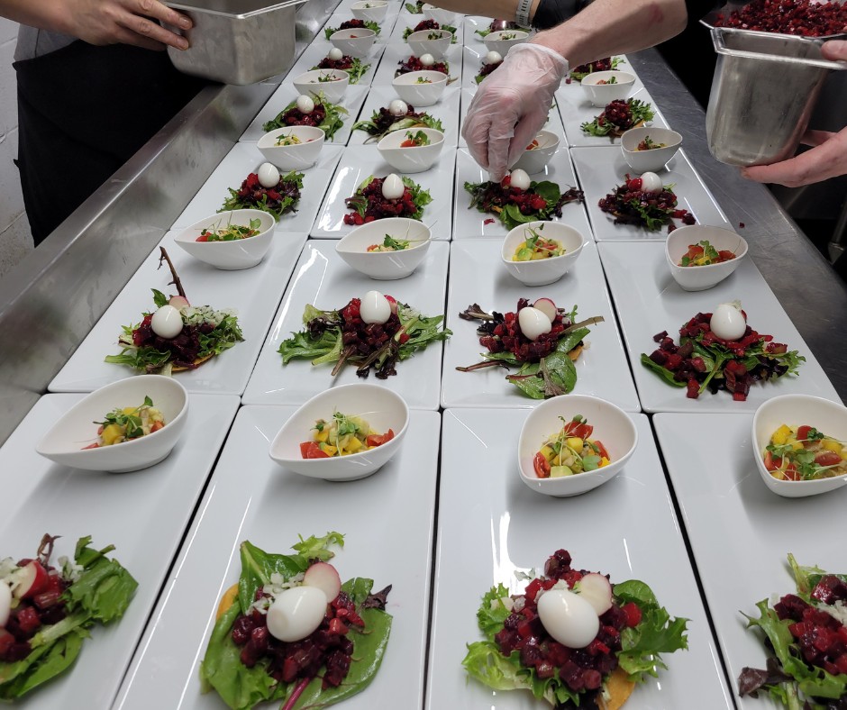 Chef assembling plates in the kitchen
